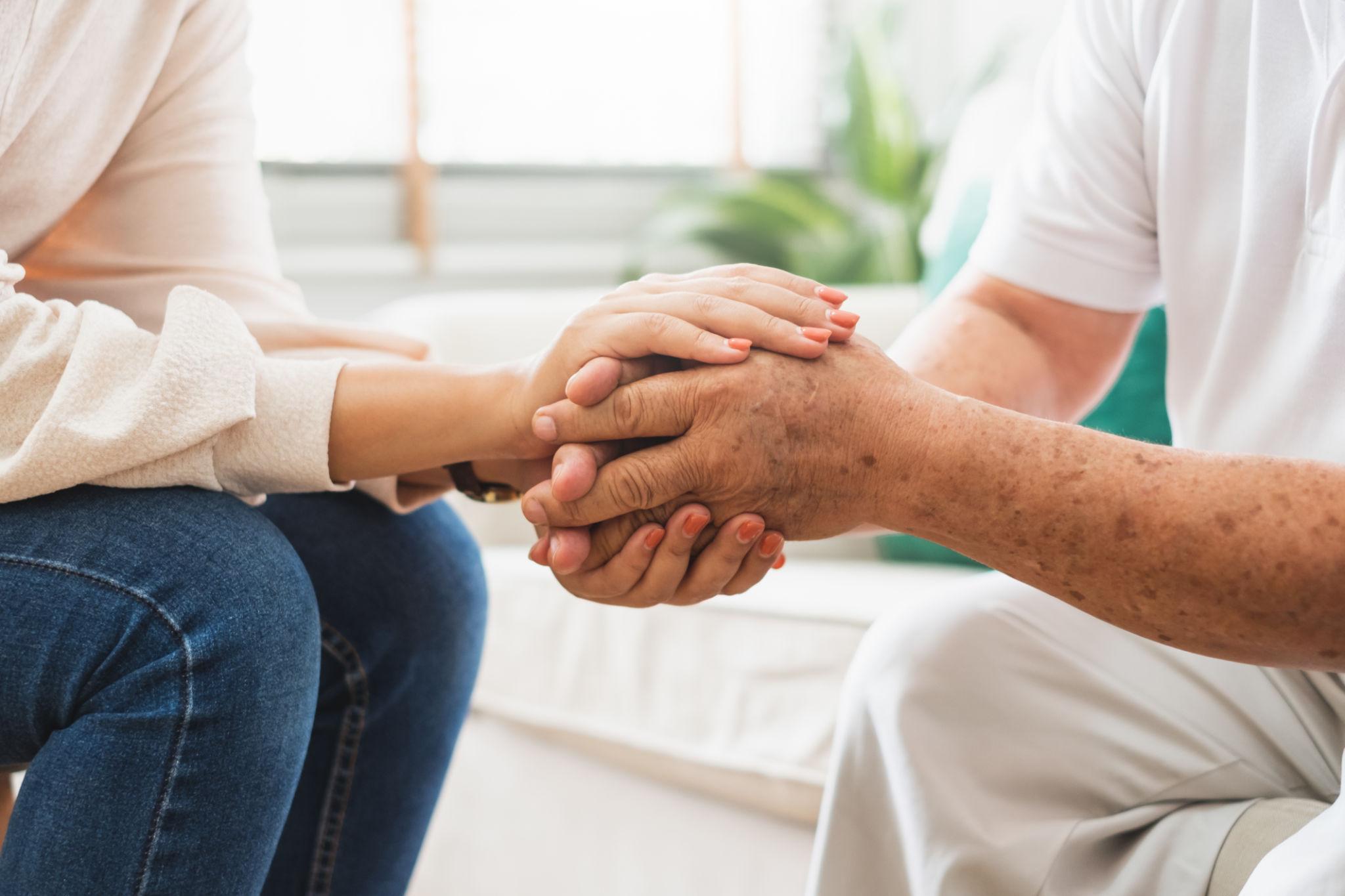 Caregiver with elderly resident at SilverOak
